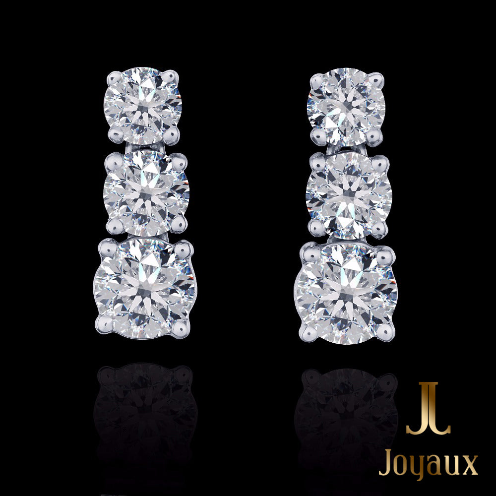 GRADUATED DIAMOND DROP EARRINGS IN 18K WHITE GOLD
