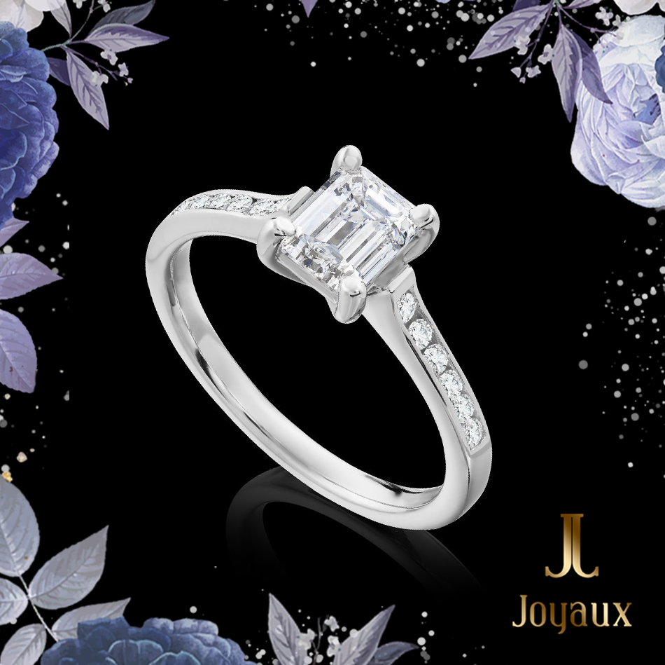 0.8 ct.tw. Emerald cut Diamond Side Stone Ring