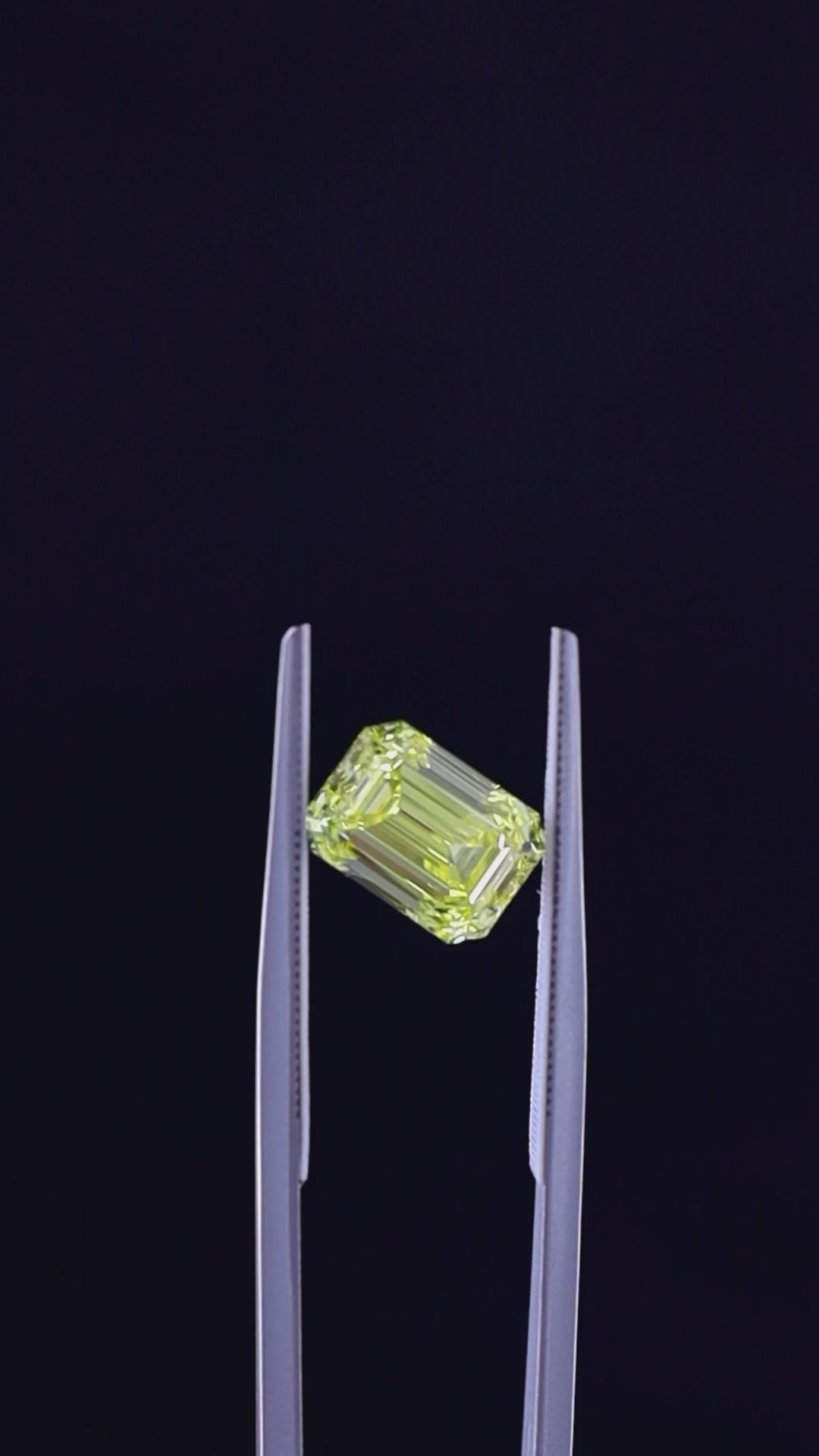 This 3.01-carat Fancy Vivid Yellow diamond is a radiant symbol of the earth’s treasures, perfect for those who seek the extraordinary in the art of gemology.