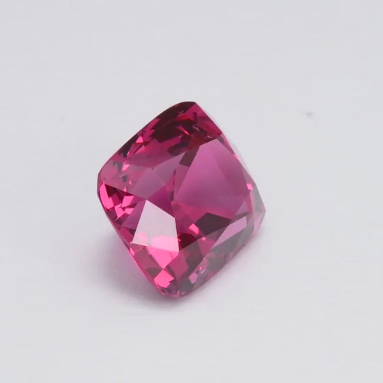 In the storied hills of Mogok, where the air is thick with tales of old, lies a gem of unparalleled magnificence. The 4.76-Carat Red Spinel from Joyaux™ Genève is not merely a stone, but a saga of the earth’s deepest secrets, reflecting the ancient legends of its origins. With dimensions of 9.50 x 8.50 x 7.20 mm, this rectangular cushion-shaped marvel dazzles with its rich red hue, embodying the fervor of a sunset over the Burmese landscape.